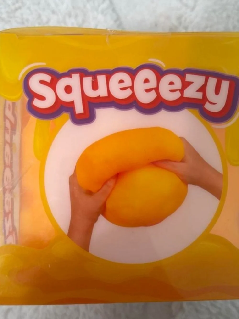 Yellow Squeeze Toy - Try Me!